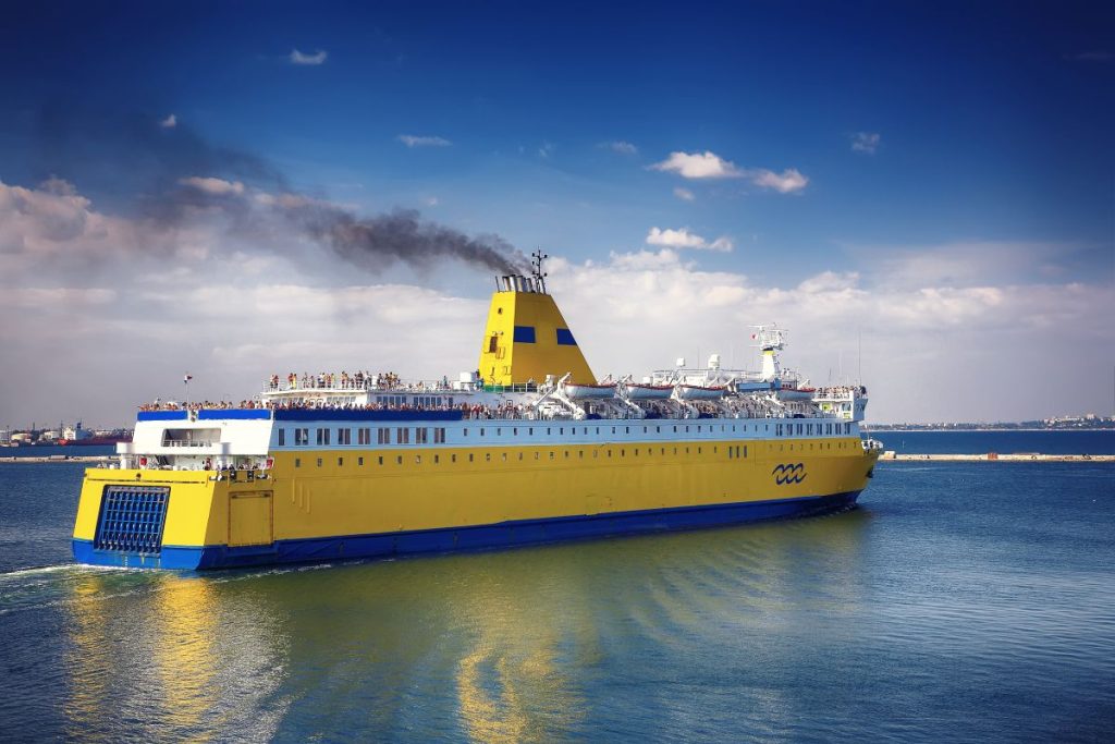 cruise ship departing from port