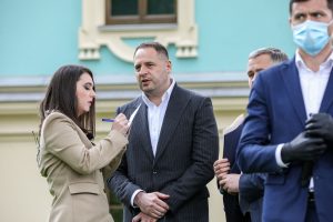 Press Secretary of the President Volodymyr Zelensky, Yulia Mendel,  speaks to the Andriy Yermak, Head of the Presidential Office during a press conference in Kyiv on May 20, 2020.